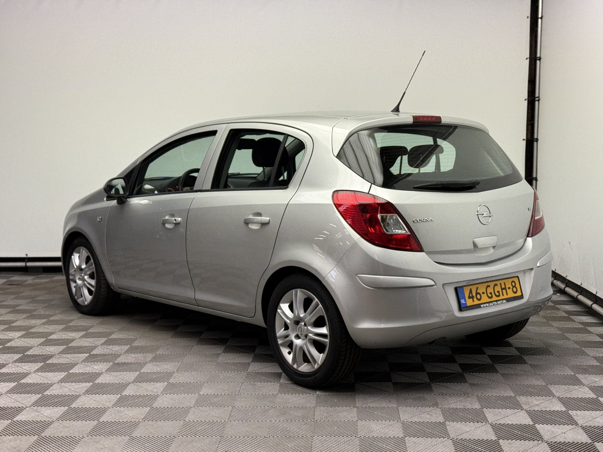 Opel Corsa 1.4-16V Enjoy 5-drs Airco LM16" NL Auto, Auto's, Voorwielaandrijving, Gebruikt, 4 cilinders, Met garantie (alle)