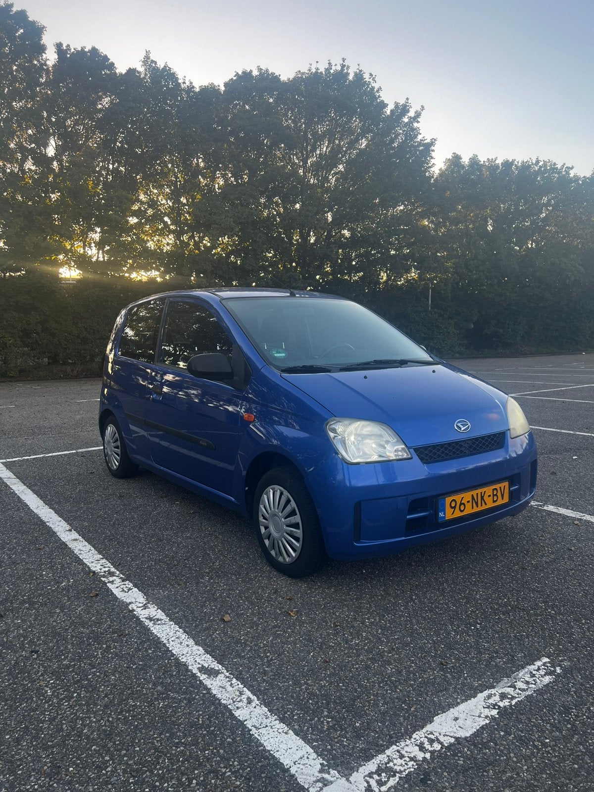 Daihatsu Cuore 1.0 3D AUT 2003 Blauw, Stof, 600 kg, Zwart, 18 €/maand