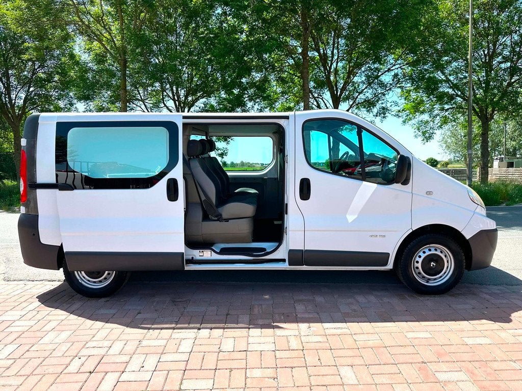 Renault Trafic 2.0 dCi T29 L2H1 DC Eco 6 Pers. AIRCO/CRUISE, Auto's, Bestelauto's, Voorwielaandrijving, Euro 5, Stof, Parkeersensor