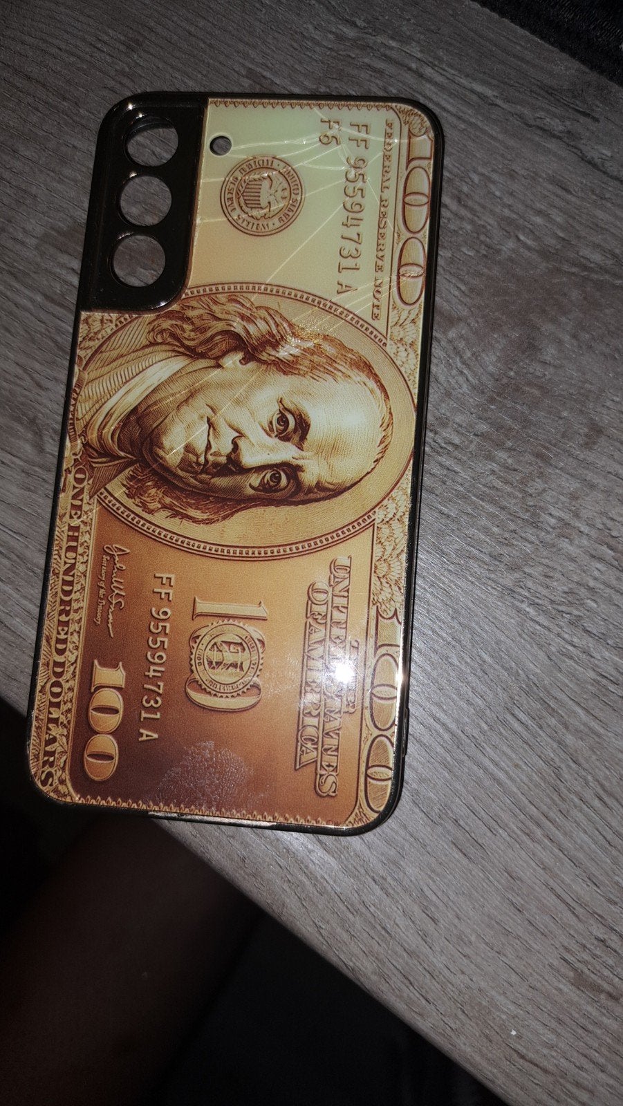 Telefoonhoesje met 100 dollar biljet design, Ophalen