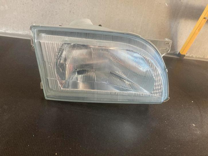 Nieuwe rechter koplamp van een Ford Transit Mk 4, Auto-onderdelen, Verlichting, Ophalen, Nieuw, Ford