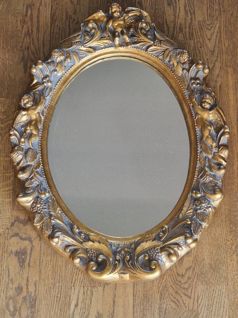 Vintage goudkleurige cherubijn ovale spiegel  in rococostijl, Minder dan 50 cm, Gebruikt, Ophalen of Verzenden, Minder dan 100 cm
