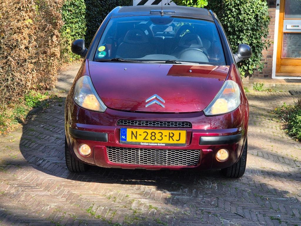 Citroën C3 1.4 I Pluriel 2010 Rood, Auto's, Citroën, Voorwielaandrijving, 1360 cc, 4 stoelen, 49 €/maand