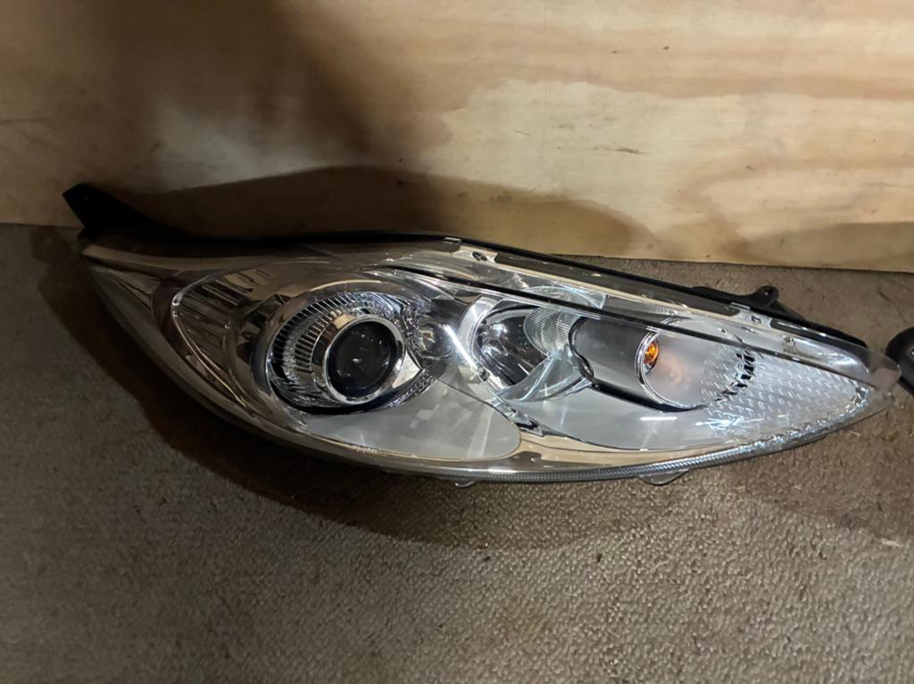 Originele koplamp set Ford Fiesta, Ophalen of Verzenden, Ford