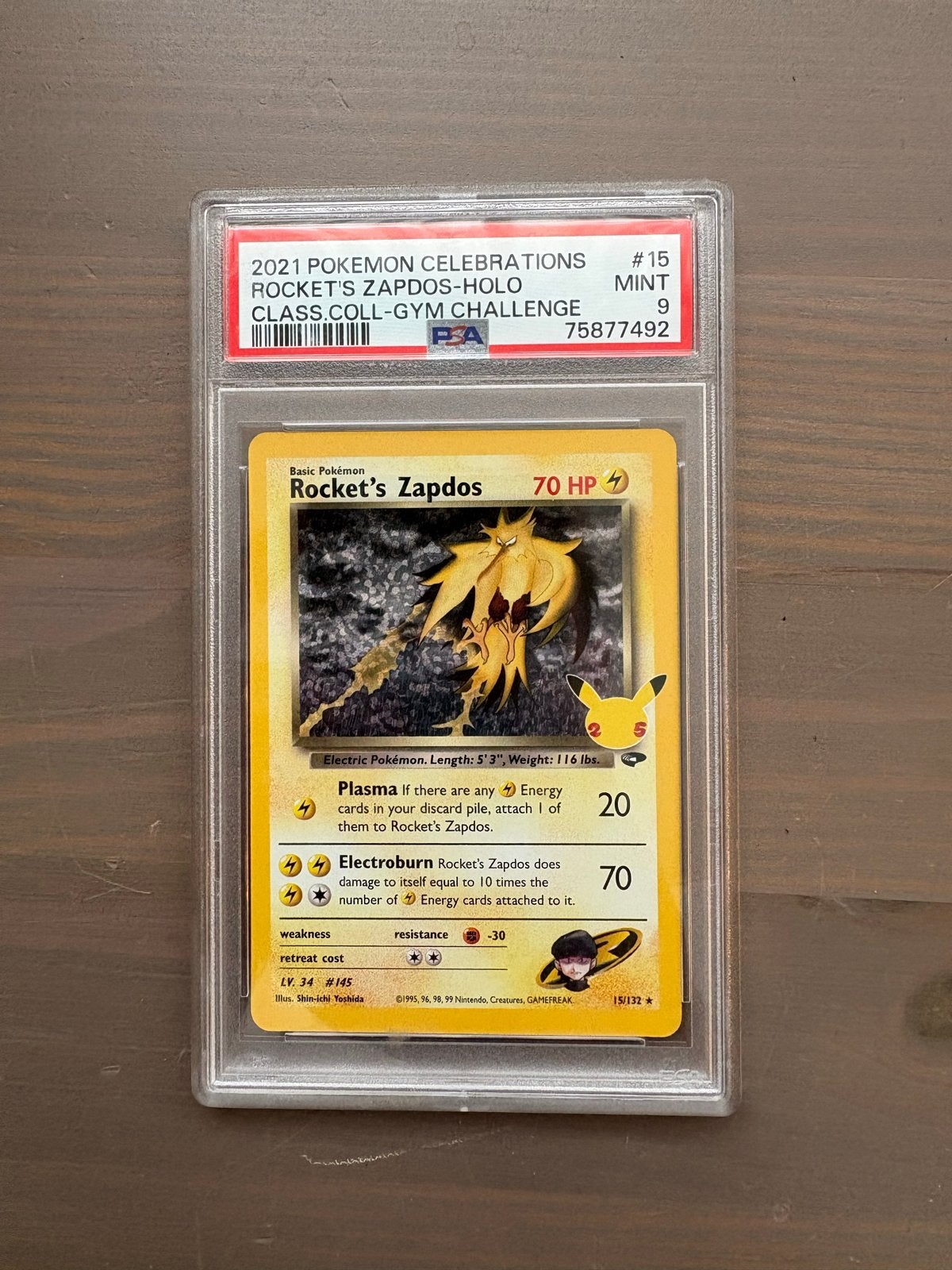 PSA 9 Rocket's Zapdos Holo 2021 Celebrations Pokémon Kaart, Ophalen of Verzenden, Zo goed als nieuw, Losse kaart, Foil