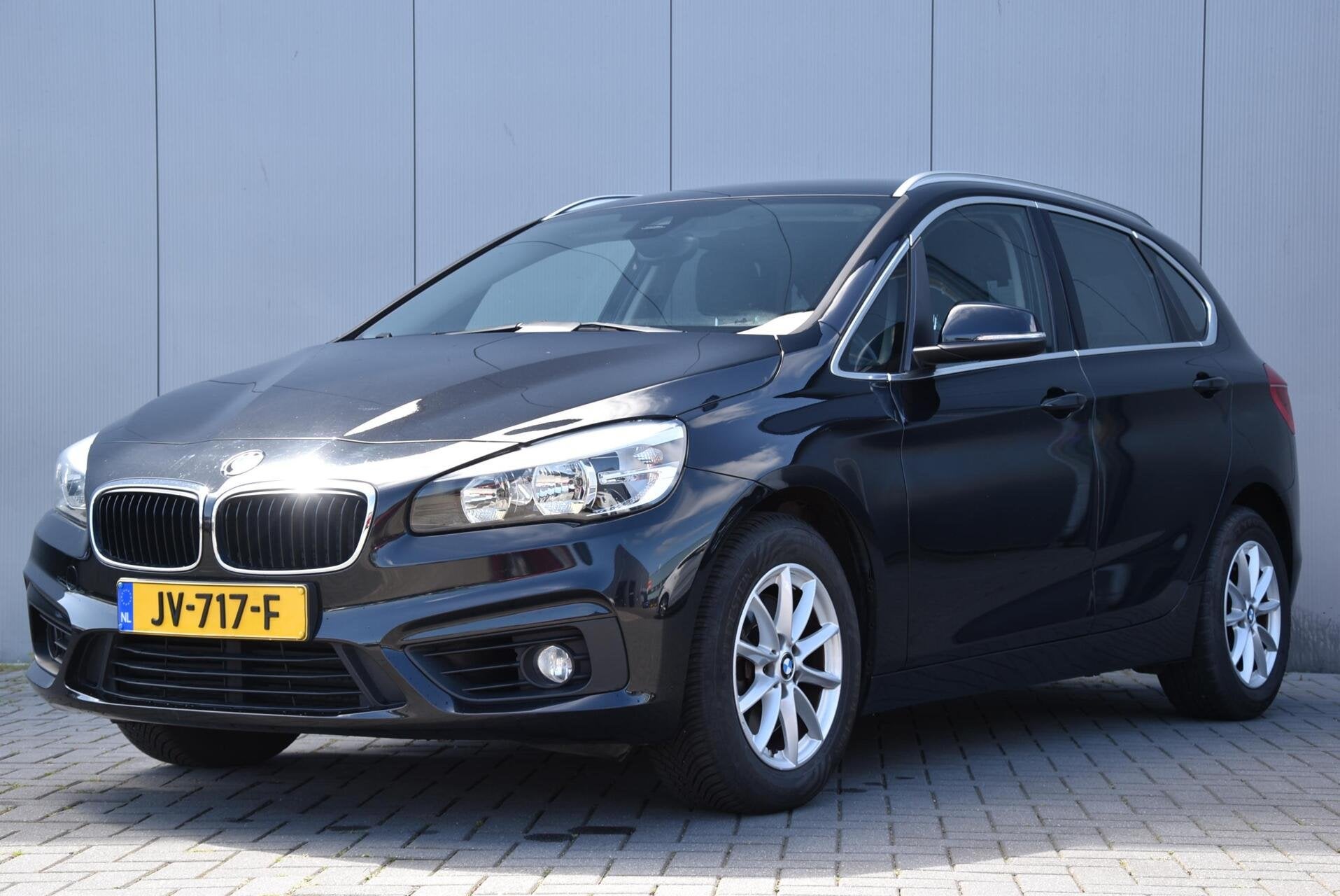 BMW 2-serie Active Tourer 218i | Cruise | Climate | Trekhaak, Auto's, 136 pk, Gebruikt, Euro 6, Zwart