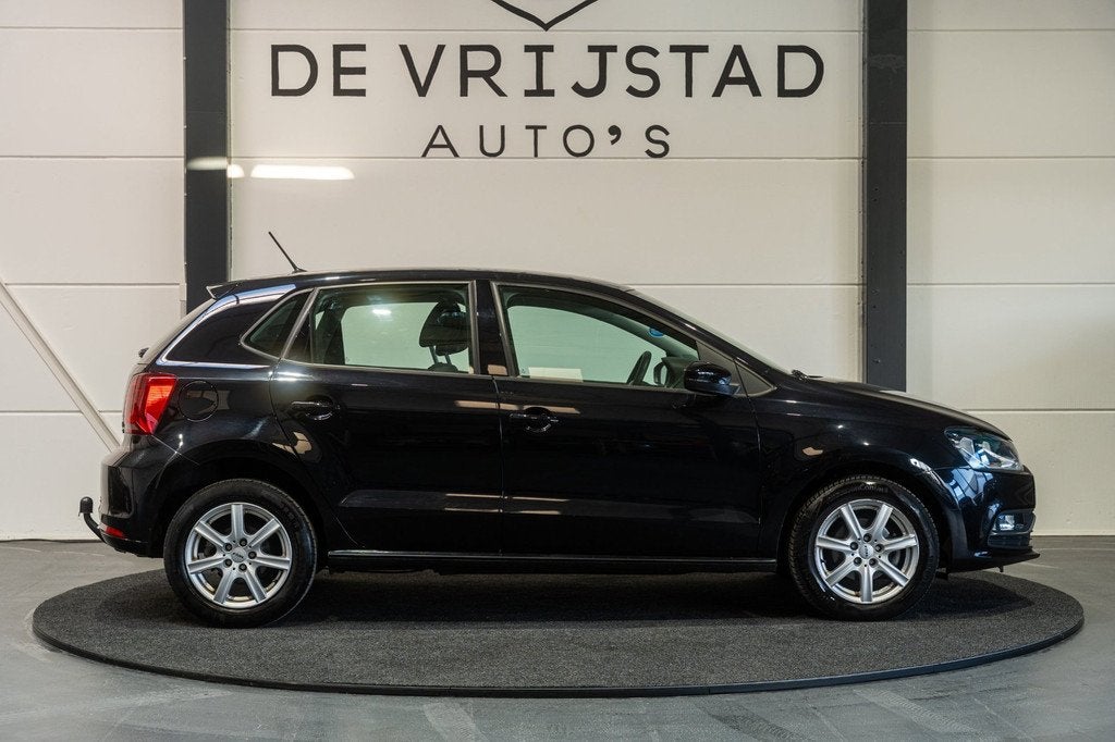 Volkswagen Polo 1.2 TSI Comfortline, Stof, 4 cilinders, Met garantie (alle), Zwart