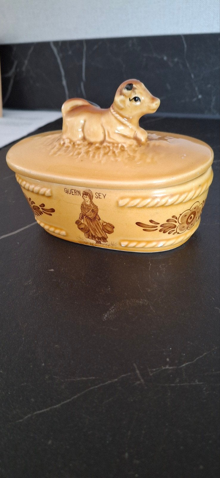 vintage botervloot Guernsey, Ophalen