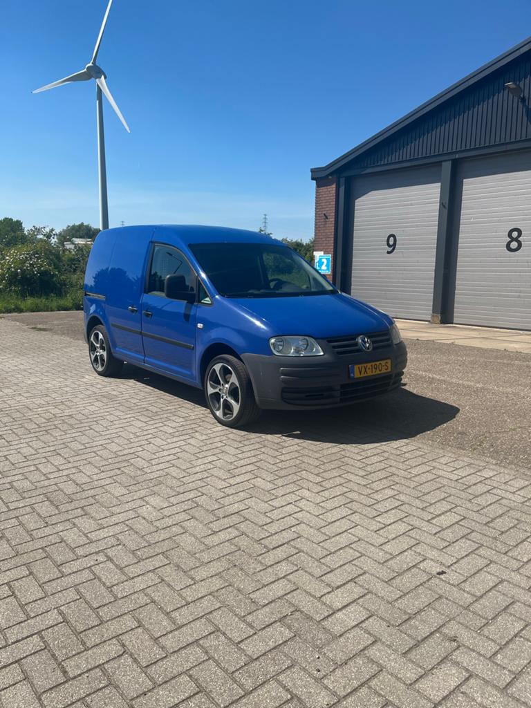 Volkswagen caddy 2005 benzine 1.6, Auto's, Bestelauto's, Voorwielaandrijving, Zwart, 4 cilinders, Leder en Stof
