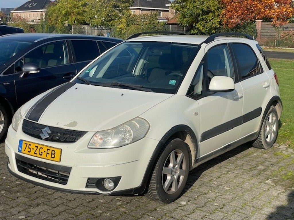 Suzuki SX4 1.6 Airco/ Trekhaak/ LM/ Dakrails, 15 km/l, Gebruikt, 4 cilinders, Origineel Nederlands