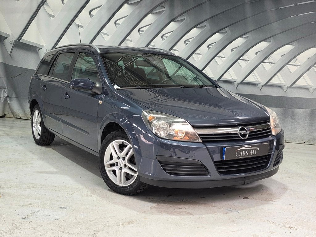 Opel Astra Wagon 1.8 Cosmo Automaat, Auto's, Opel, Stof, Gebruikt, Beige, 4 cilinders