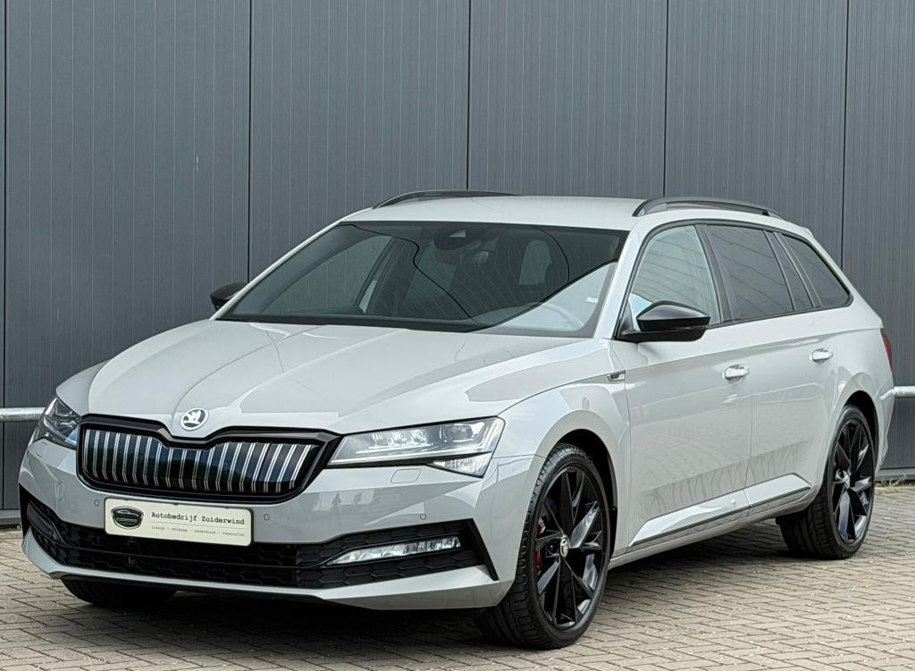 Skoda Superb Combi 1.4 TSi 218pk iV Sportline, Auto's, Skoda, Plug-in hybride, Te koop, 750 kg, Lichtsensor