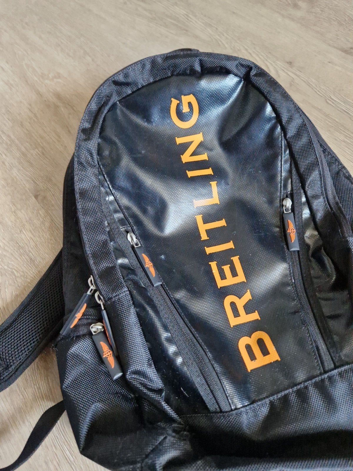 Breitling Rugzak - Zwart met oranje logo, Ophalen of Verzenden, Gebruikt, Overige merken