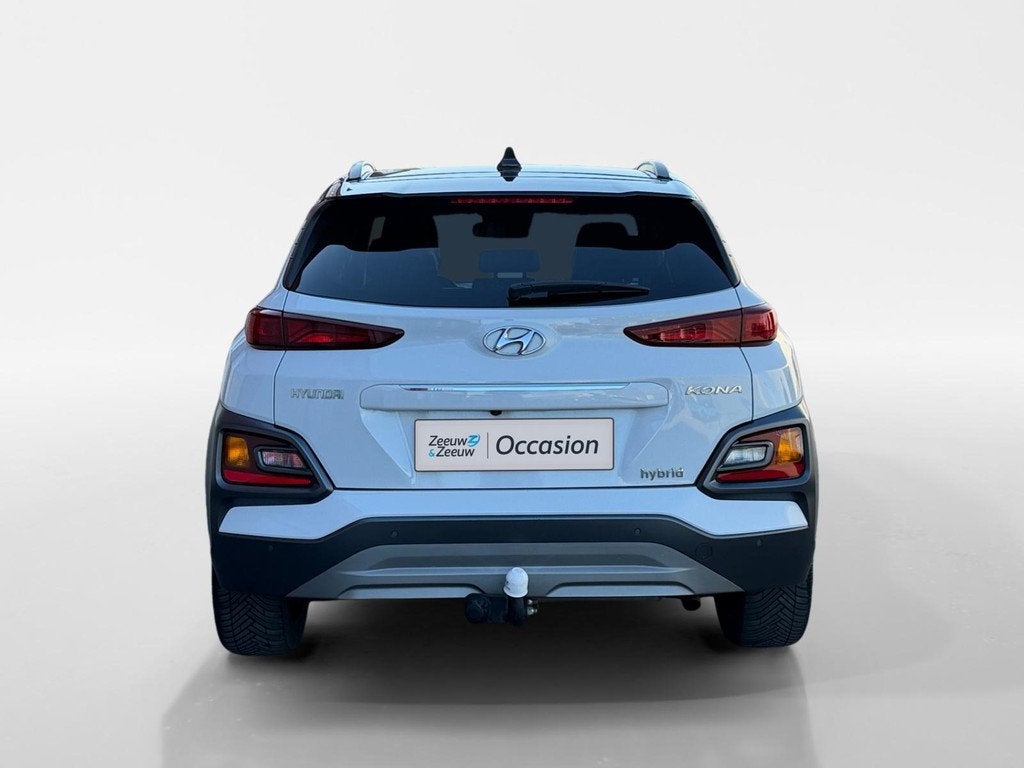 Hyundai Kona 1.6 GDI HEV Premium 105PK AUTOMAAT WK DEAL €, Auto's, Hyundai, 12 maanden, Gebruikt, Euro 6, Wit