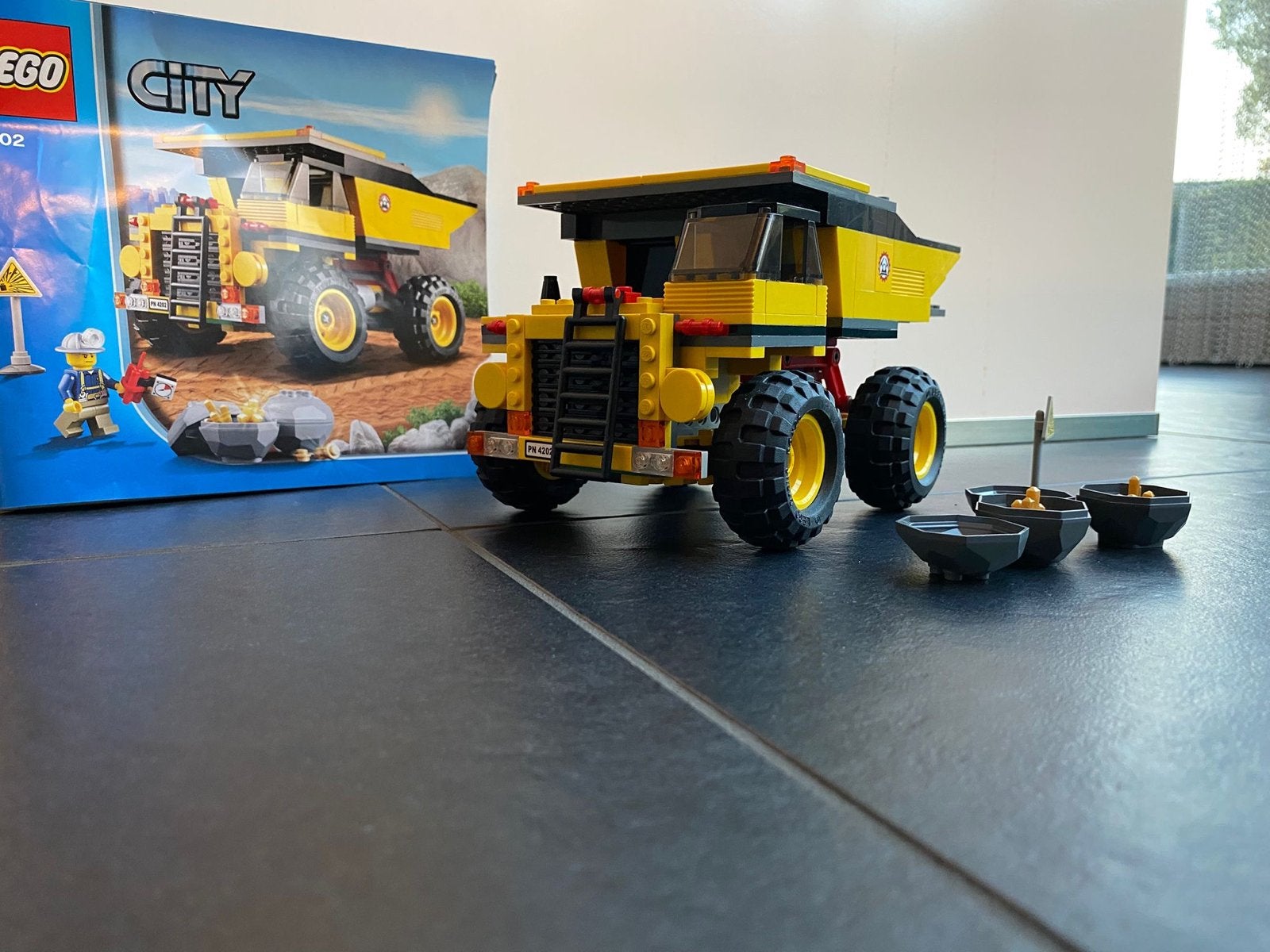 Lego City 4202 Mijnbouw Vrachtwagen met figuur en accessoire, Ophalen of Verzenden, Zo goed als nieuw, Overige merken