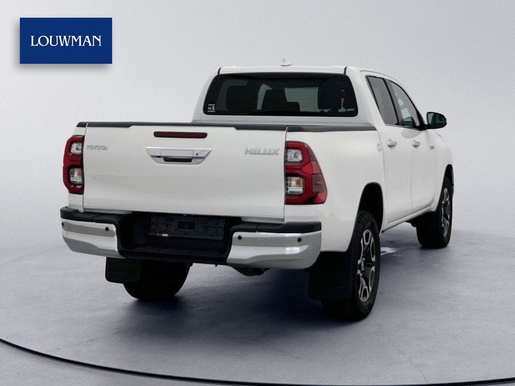 Toyota Hilux 2.8 D-4D Double Cab Professional 4x4 Navigatie, Auto's, Stof, Gebruikt, Zwart, 4 cilinders