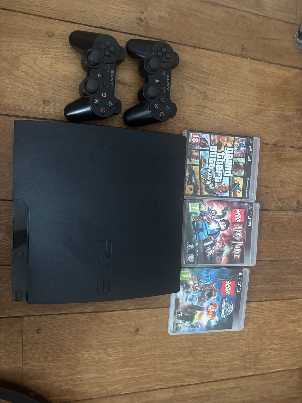 Playstation 3 +2 controleers en 3 spelletjes, Avontuur en Actie, 2 spelers, Ophalen of Verzenden, Zo goed als nieuw