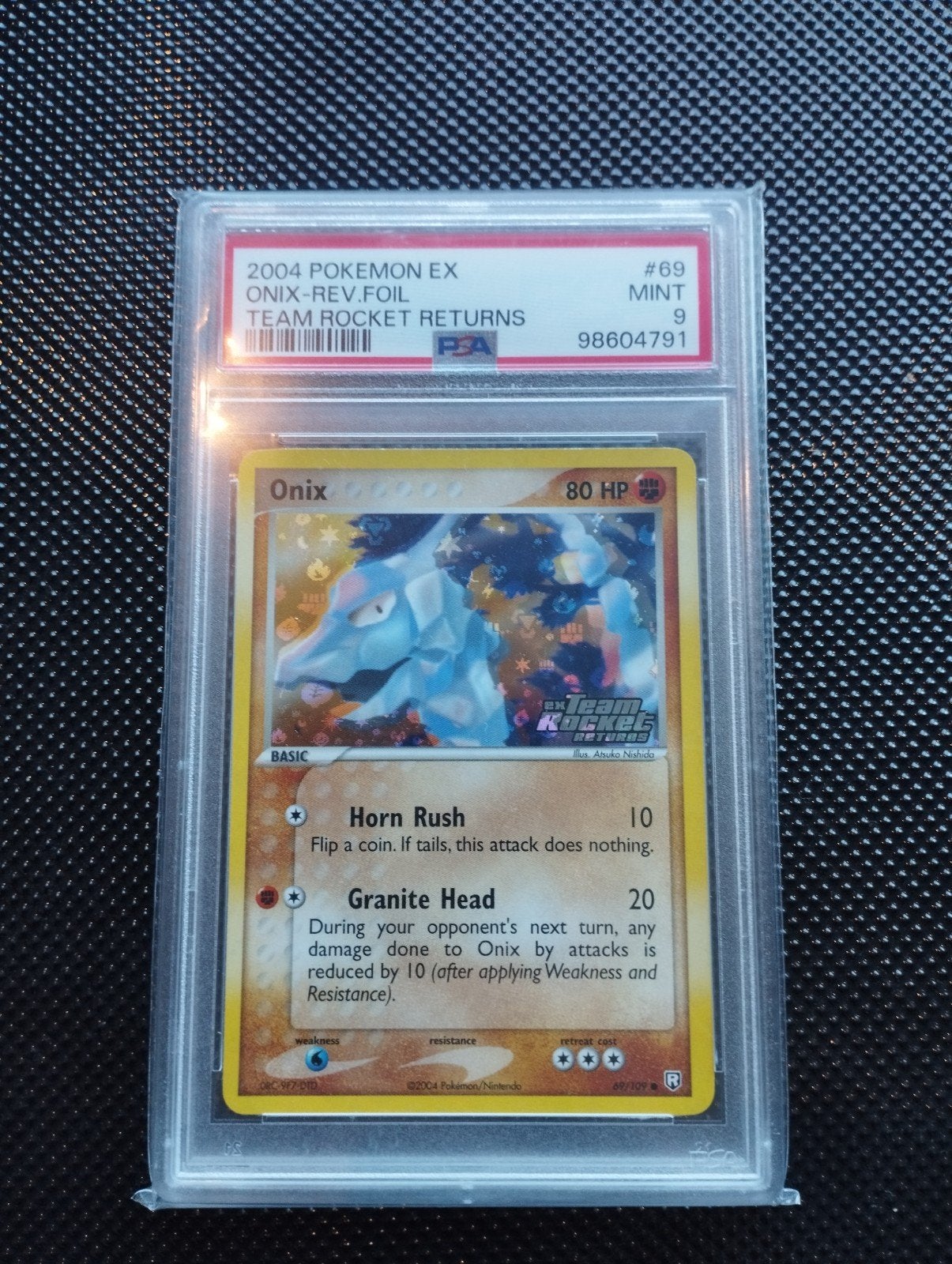 Onix Reverse Holo Stamped Pokemon kaart TRR PSA9 NM, Ophalen of Verzenden, Zo goed als nieuw