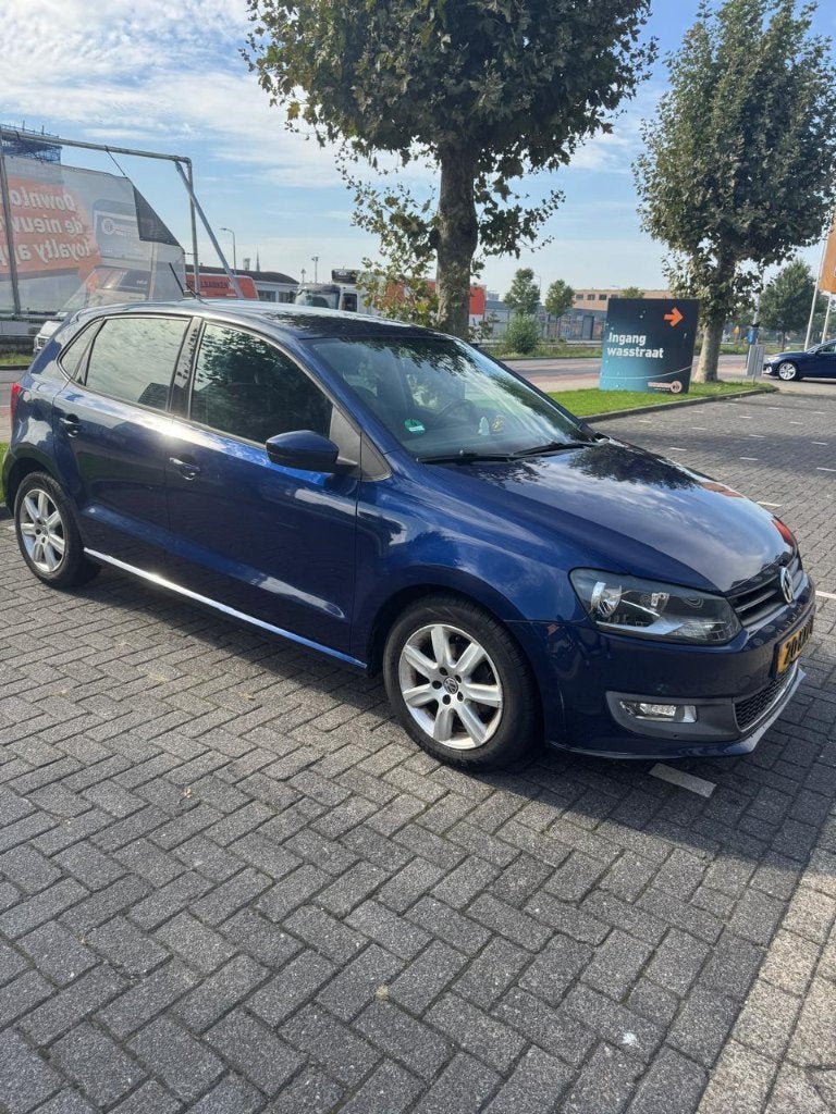 Volkswagen Polo 1.4 16V FSI 63KW 2010 Blauw, Auto's, Voorwielaandrijving, 970 kg, 40 €/maand, Beige