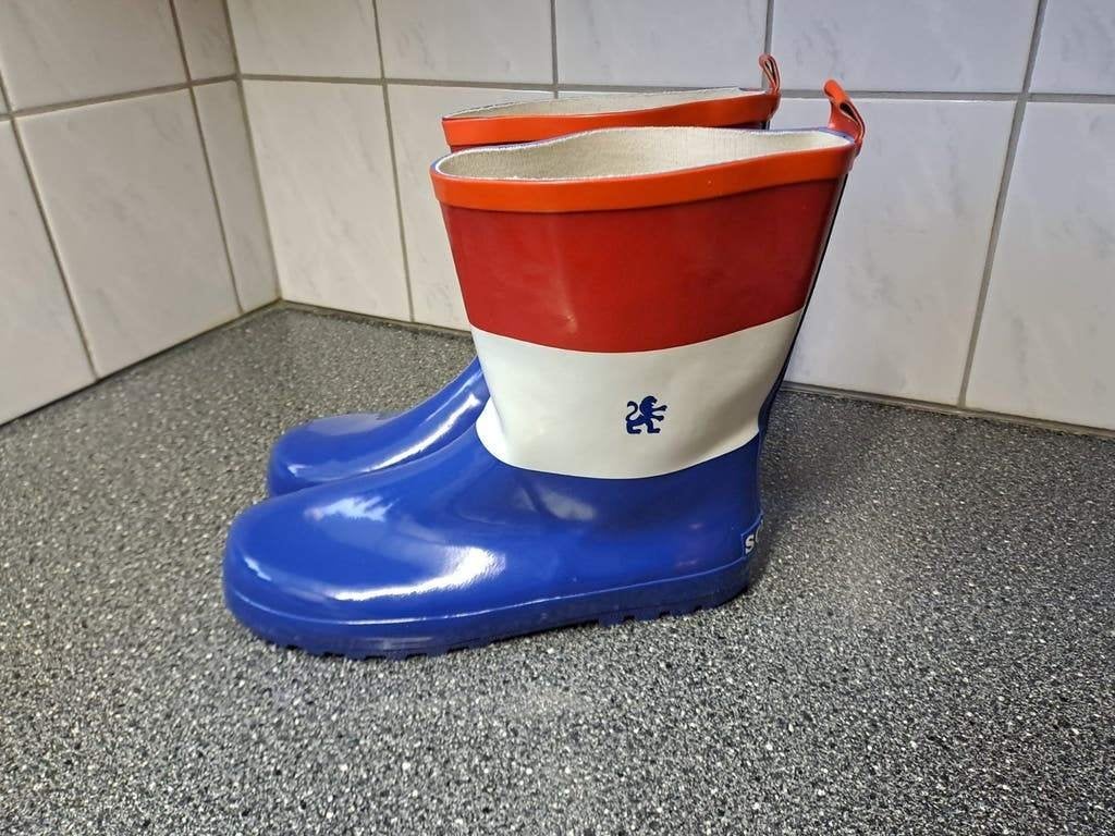 Nieuwe Sourcy regenlaarzen - Nederlands vlag design, Onbekend, Ophalen of Verzenden, Zo goed als nieuw, Onbekend