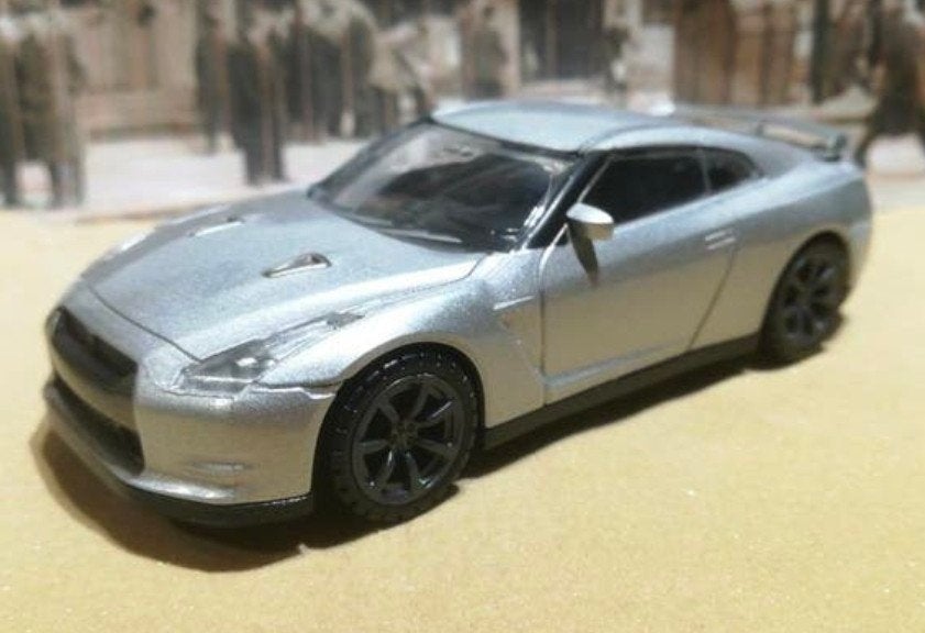 2011 Nissan GT-R 1:43 Rastar, Hobby en Vrije tijd, Ophalen of Verzenden, Nieuw, Auto, Overige merken