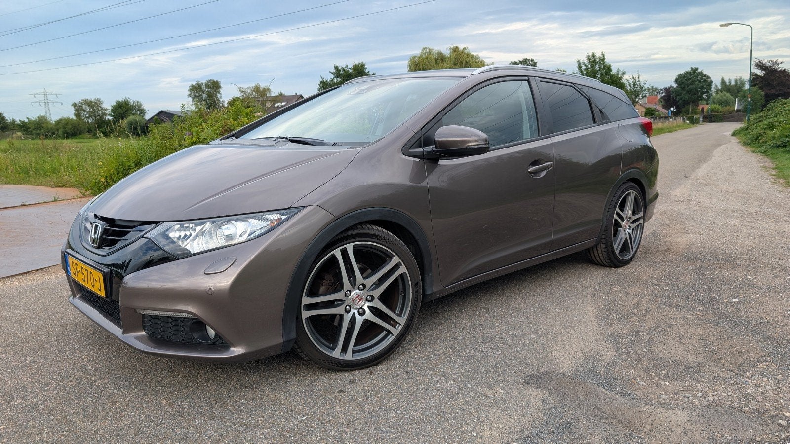 Honda Civic 1.8 104KW Tourer 2015 Bruin, Voorwielaandrijving, Zwart, 4 cilinders, Bruin