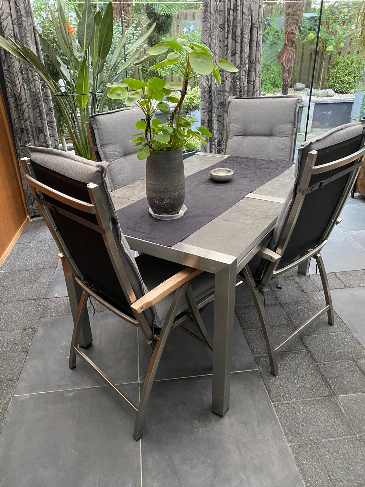RVS tuinset tafel en vier stoelen met kussens, Tuin en Terras, Ophalen, Zo goed als nieuw
