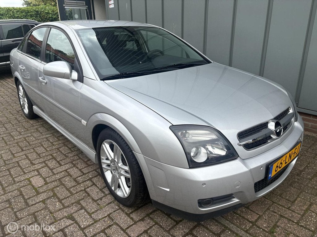 Opel Vectra GTS 3.2 V6 Elegance, Gebruikt, Leder en Stof, Vectra, Origineel Nederlands