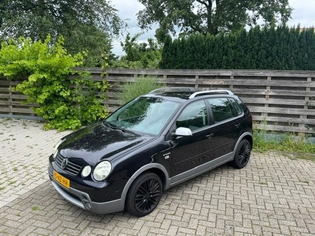 Volkswagen Polo Fun 1.4 55KW 2004, cruise, sportieve auto!, Auto's, Voorwielaandrijving, 4 cilinders, Zwart, Origineel Nederlands