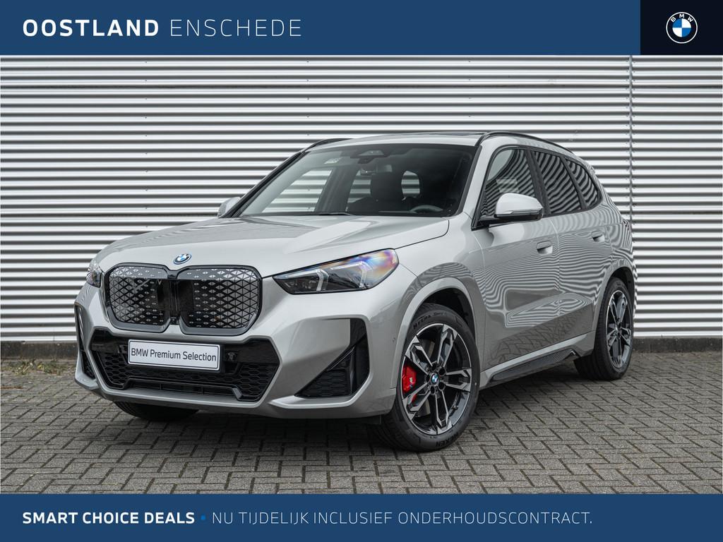BMW iX1 eDrive20 M Sport / Trekhaak / Panoramadak / Sportsto, Auto's, BMW, Bedrijf, Te koop, iX1, Alarm, Bochtverlichting, Digitale radio-ontvangst