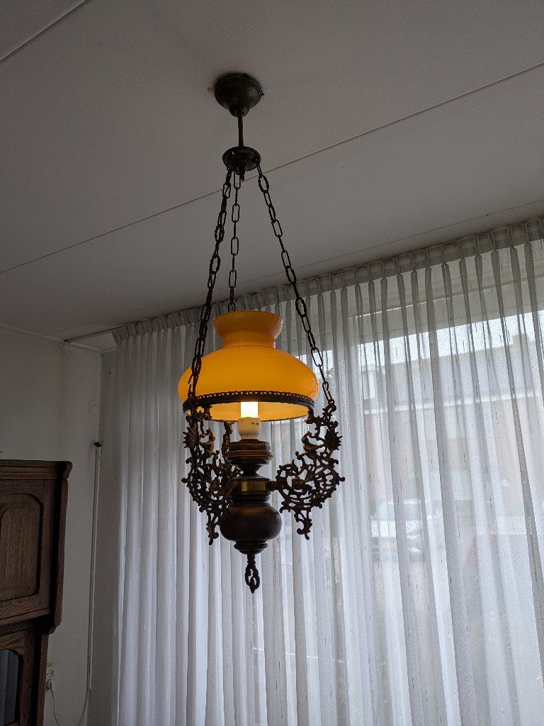 Antieke hanglamp met kelk, Ophalen