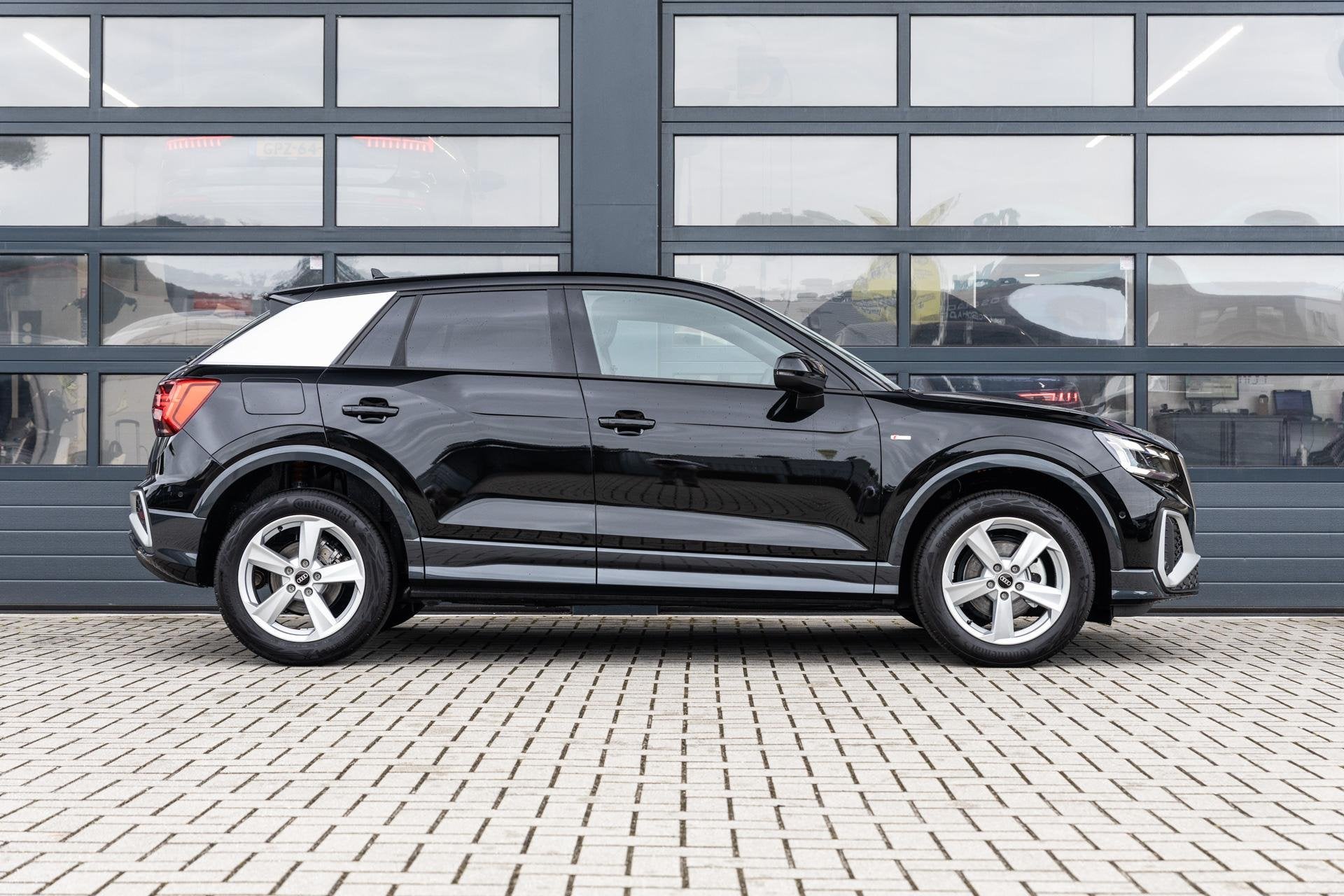 Audi Q2 35 TFSI 150pk S-tronic S Edition | Stoelverwarming |, Auto's, 12 maanden, 4 cilinders, Leder en Stof, Zwart