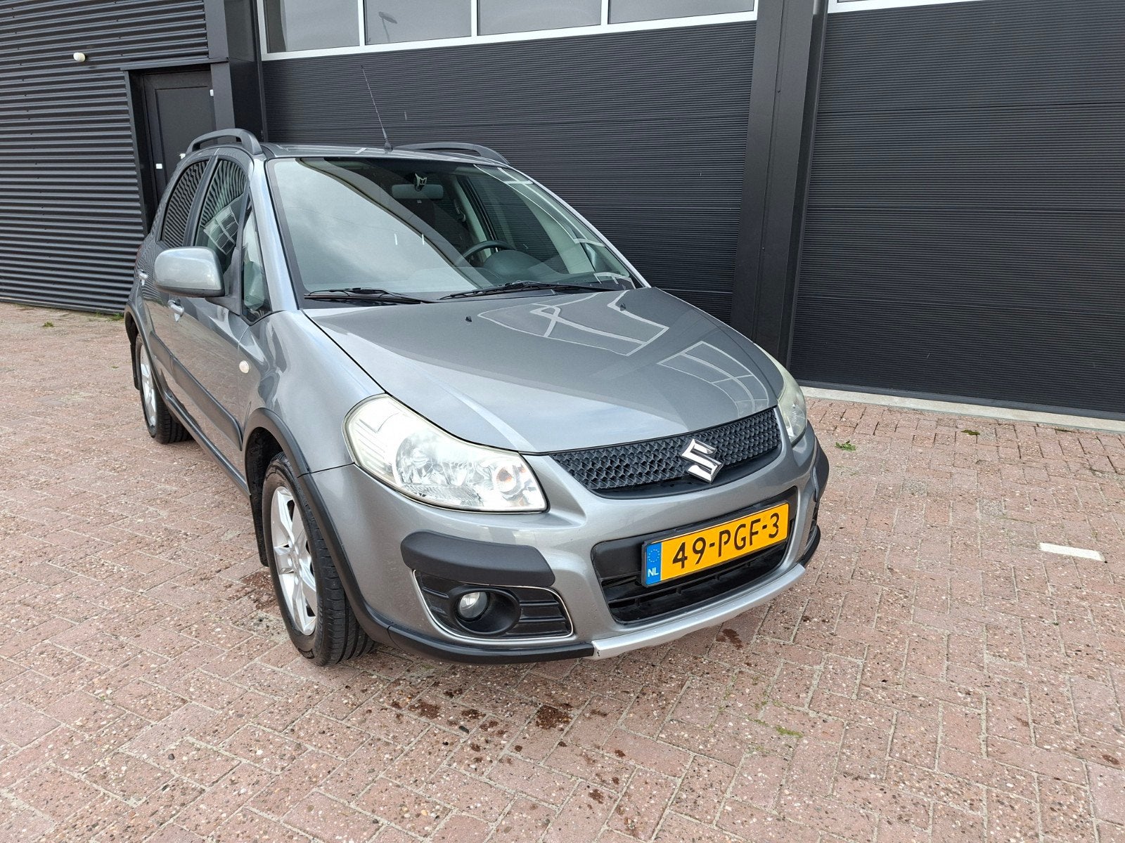 Suzuki SX4 1.6 2011 Grijs, Voorwielaandrijving, Stof, Zwart, 4 cilinders
