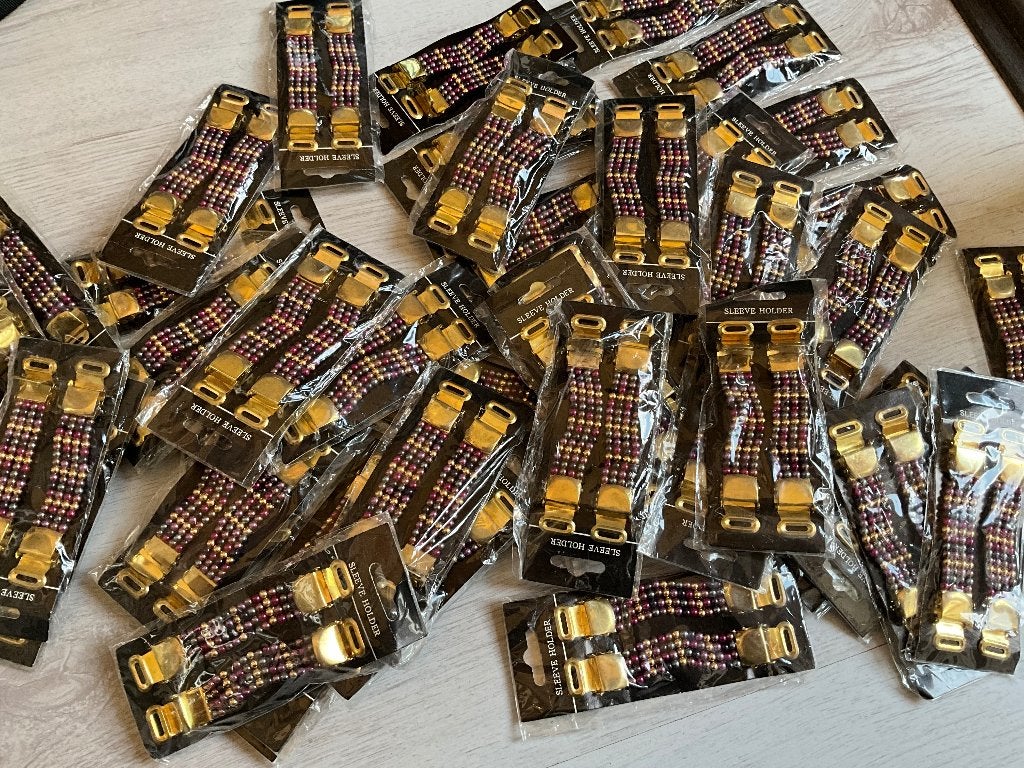 44 stuks mouwophouders antiek look per stuk verpakt, Nieuw, Ophalen of Verzenden, 44 stuks mouwophouders antiek look per stuk verpakt zie foto