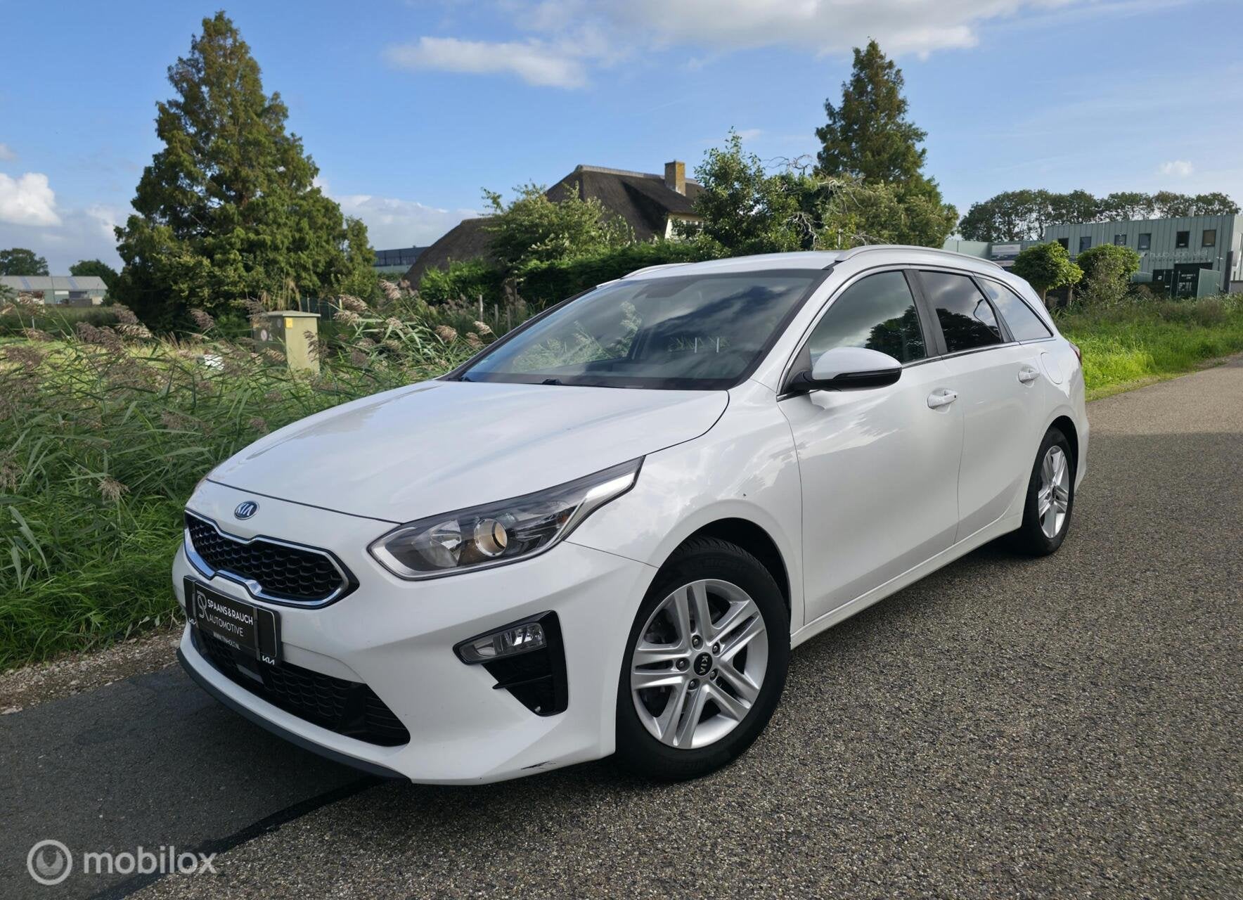 Kia Ceed Sportswagon 1.0 T-GDi / Trekh / Navi / Half leder, Voorwielaandrijving, Dealer onderhouden, Leder en Stof, Wit