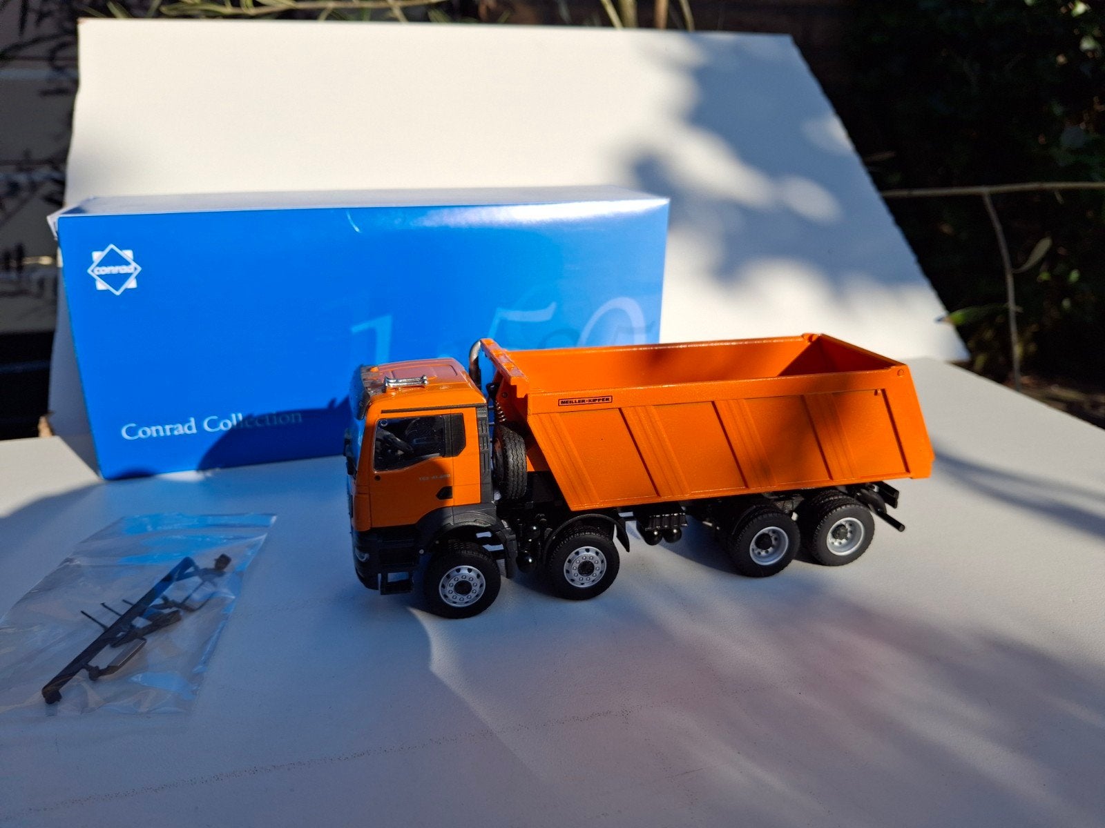 MAN TGS 4ACHS MEILLER KIPPER 1:50, Ophalen of Verzenden, Nieuw, Bus of Vrachtwagen, Conrad