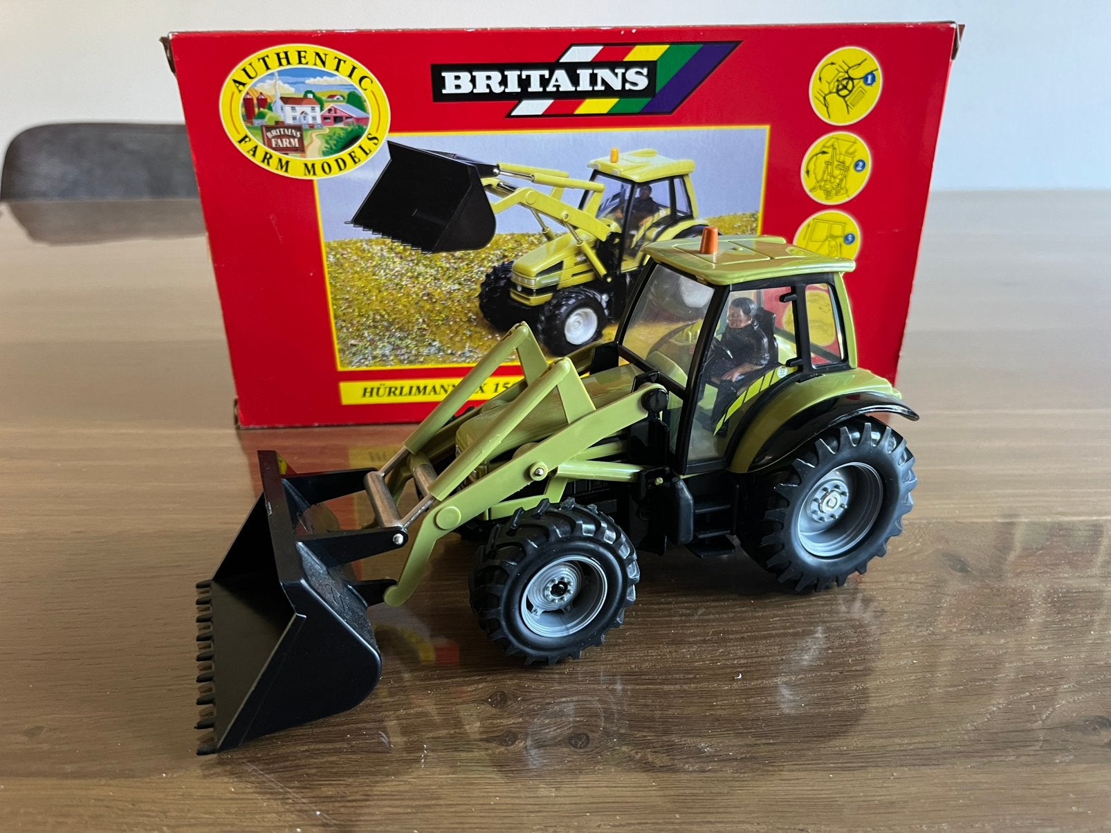 Hürlimann SX 1500 trekker met frontlader Britains  00039, Ophalen of Verzenden, Nieuw, Tractor of Landbouw, Britains