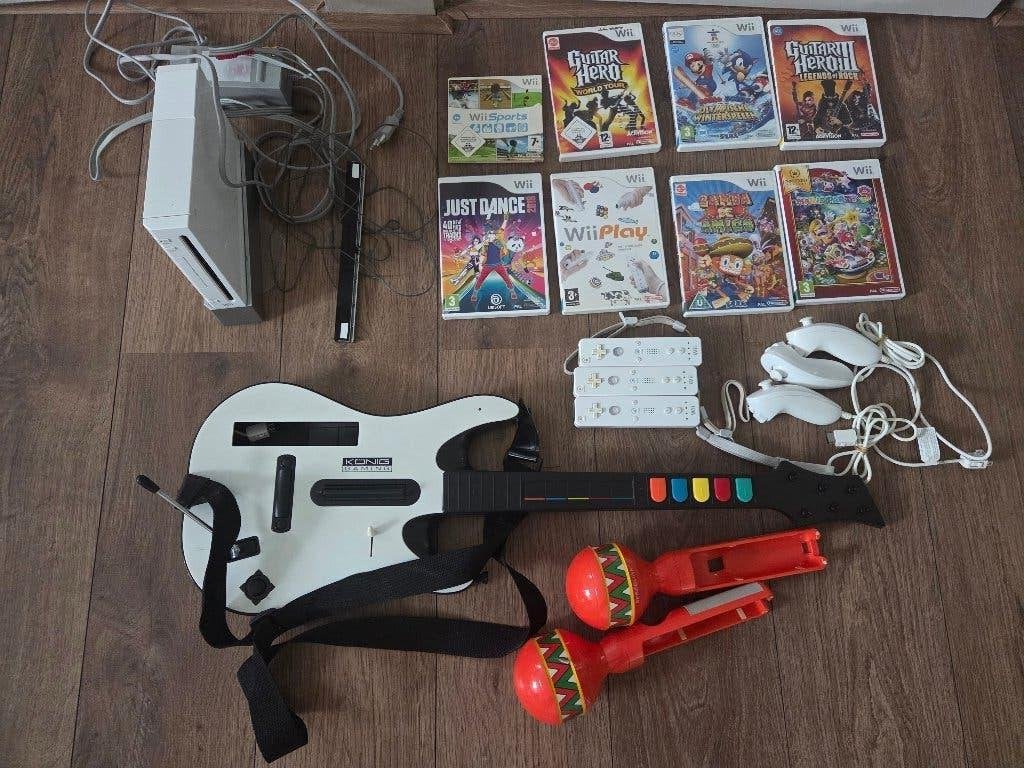Nintendo Wii set (3 controllers, 8 spellen, 2 gitaren), Spelcomputers en Games, Ophalen of Verzenden, Gebruikt, Met 3 controllers of meer