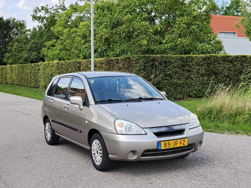 Suzuki Liana 1.6 met Gloednieuw Accu en Dynamo, Auto's, Suzuki, Voorwielaandrijving, Beige, 4 cilinders, 400 kg