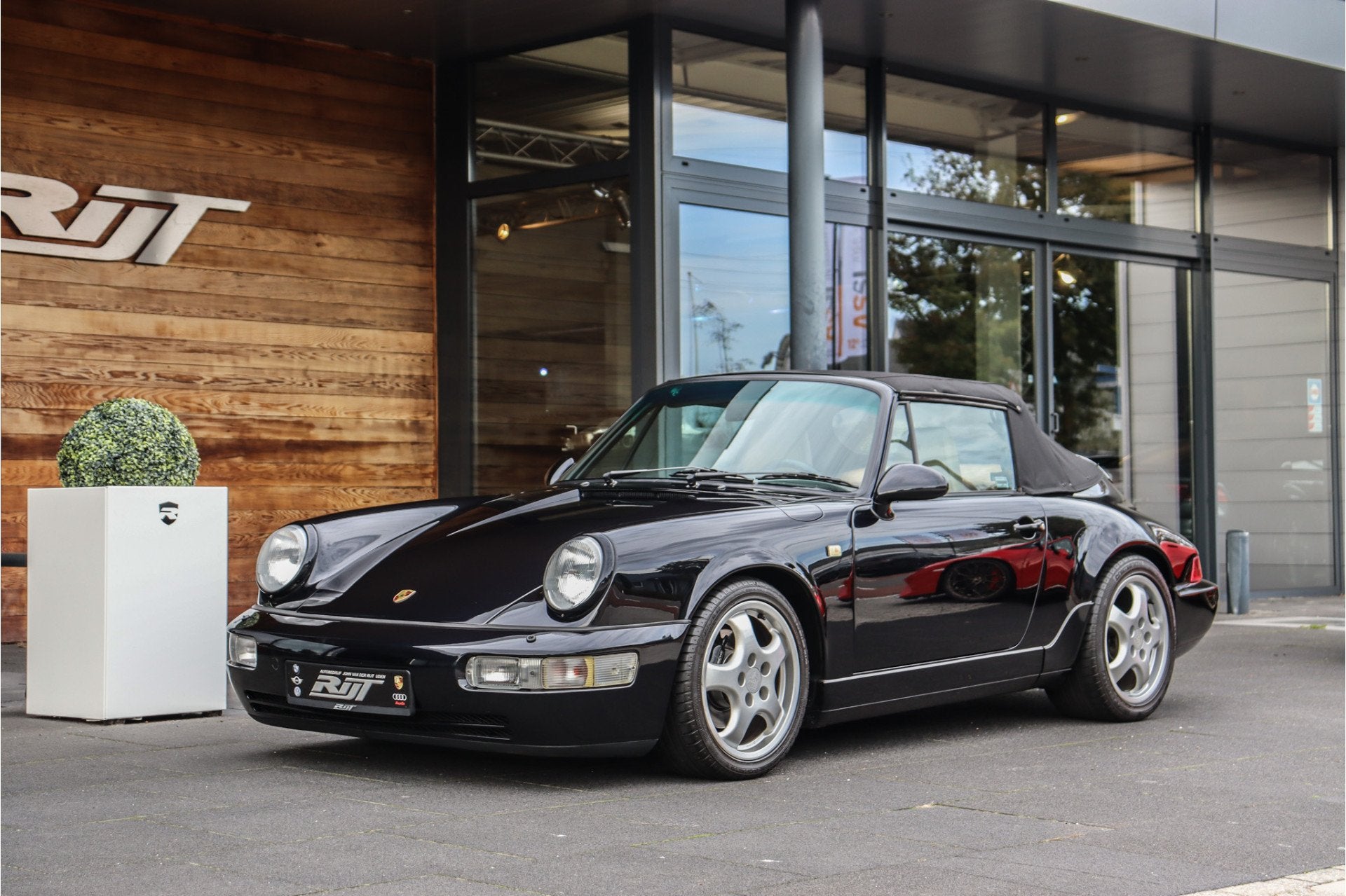 Porsche 911 964 Cabriolet 3.6 handgeschakeld Puntgaaf!, Auto's, Oldtimers, Achterwielaandrijving, Zwart, 3600 cc, Onderhoudsboekje