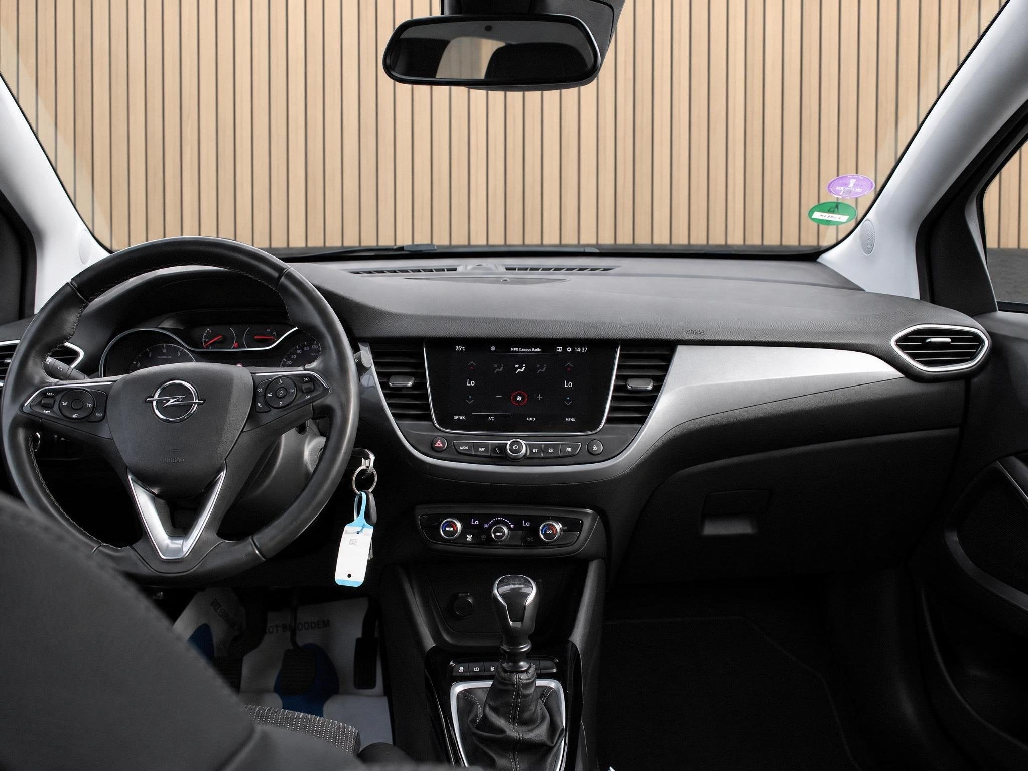 Opel Crossland 1.2 Turbo Elegance | Trekhaak / Carplay / Cam, Auto's, 12 maanden, Gebruikt, 1199 cc, Zwart
