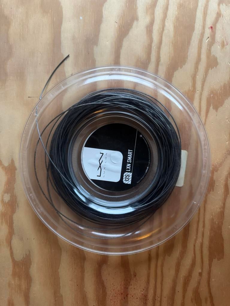 Luxilon smart 1.25, Sport en Fitness, Tennis, Grip of Snaar, L00, Nieuw, Ophalen