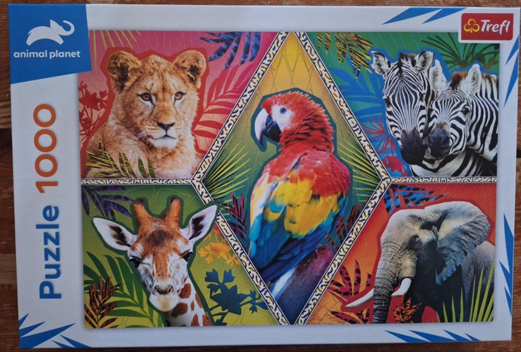 Trefl puzzel "exotische dieren " 1000 stukjes, Ophalen of Verzenden, 500 t/m 1500 stukjes, Zo goed als nieuw, Legpuzzel
