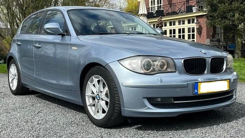 BMW 1-serie 118i Sport Line / automaat / air / navi / cruise, Auto's, 15 km/l, 1995 cc, Zwart, 1200 kg