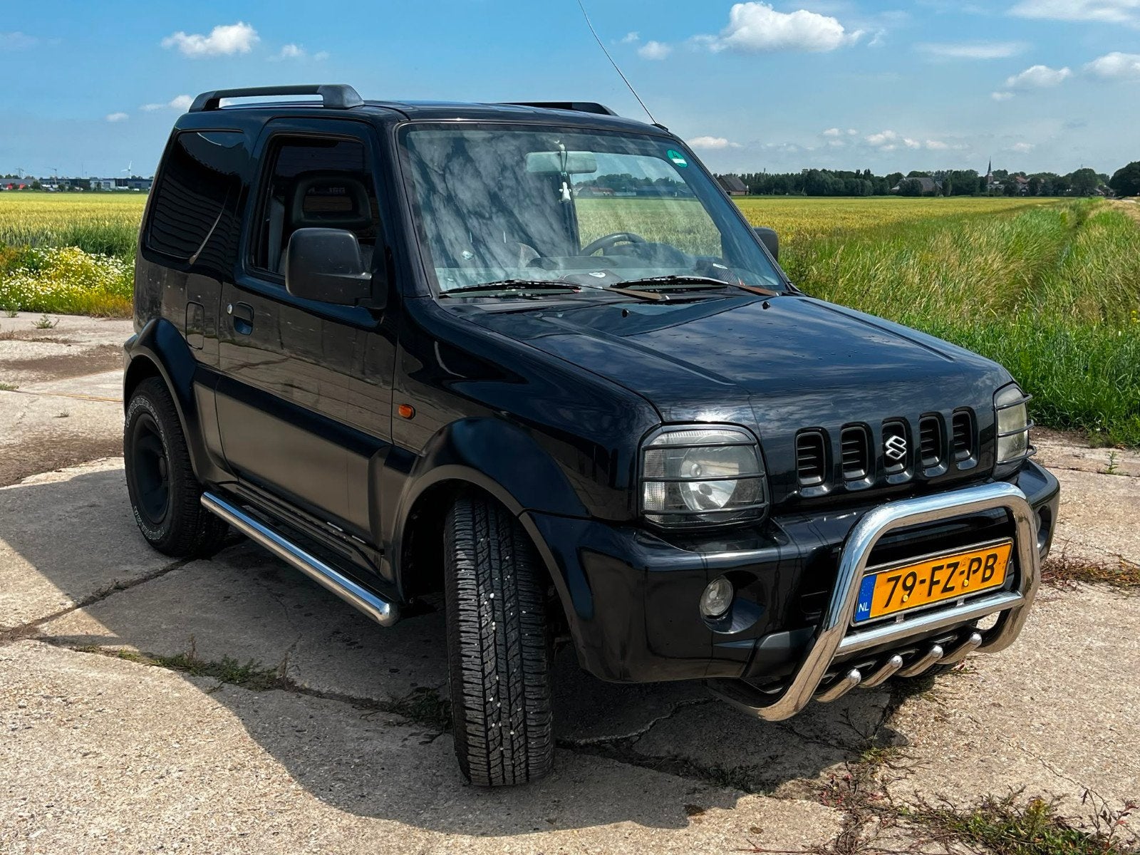Suzuki Jimny 1.3 JX 4WD 2000 Zwart, 4x4, 40 €/maand, 4 cilinders, 4 stoelen