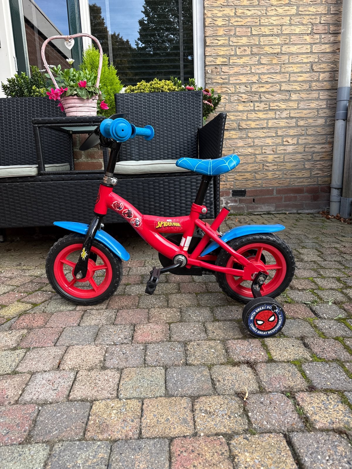 Spiderman kinderfiets met zijwieltjes, Fietsen en Brommers, Terugtraprem, Zijwieltjes, Gebruikt, Ophalen of Verzenden