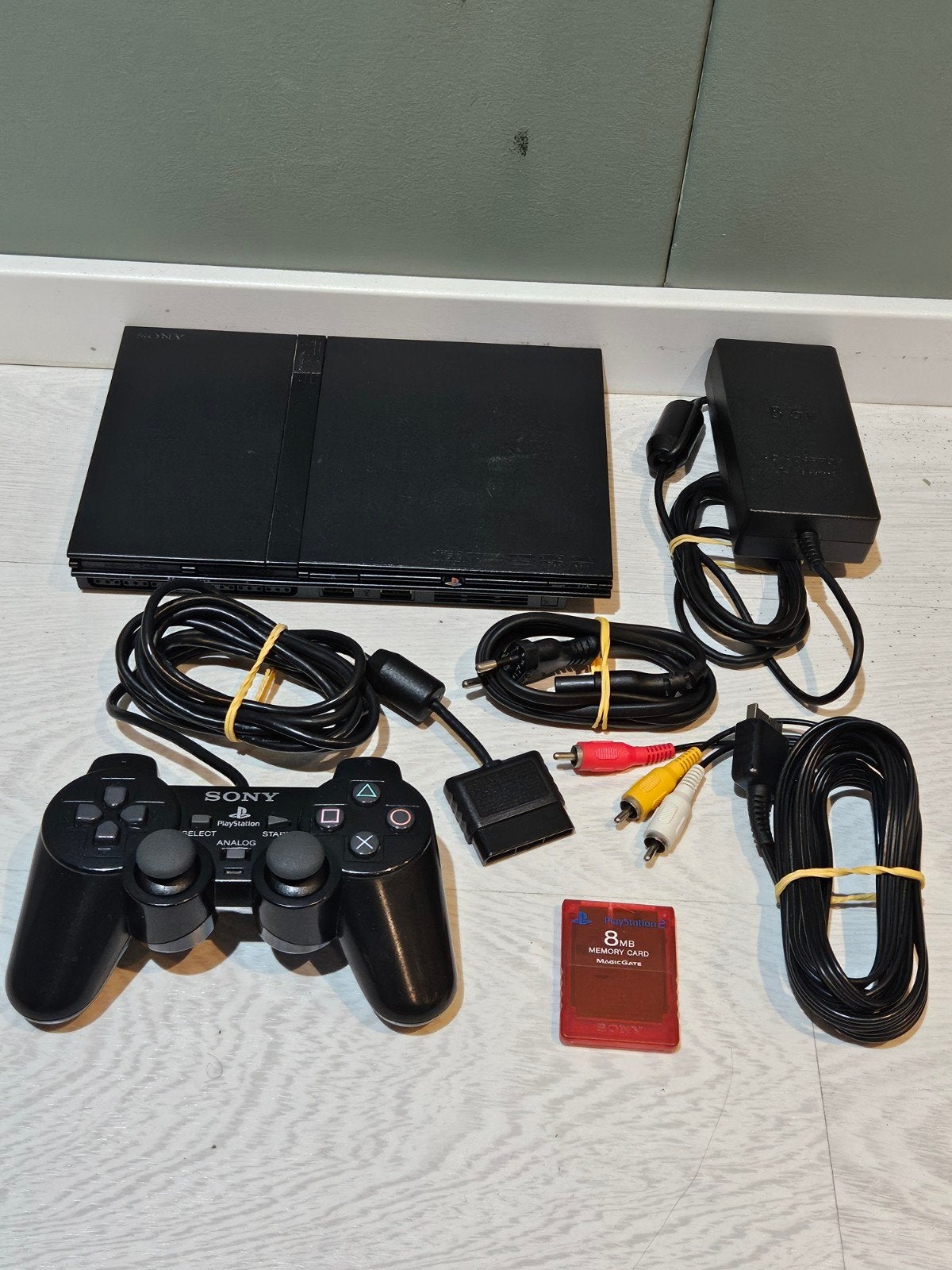 Sony PlayStation 2 Slim, Zwart, Ophalen of Verzenden, Zo goed als nieuw, Met geheugenkaart