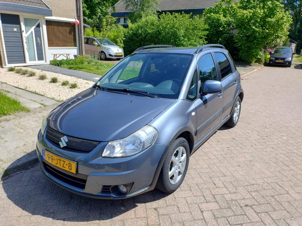 Suzuki SX4 1.6 2009 Grijs handgeschakeld goede staat, Auto's, 4 cilinders, 49 €/maand, Origineel Nederlands, 1200 kg