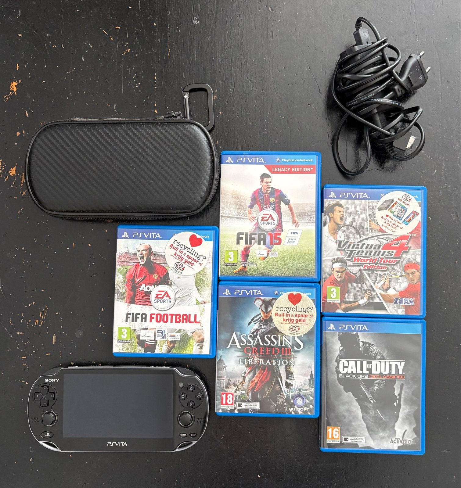 PS Vita met 5 games, hoesje en oplader, Spelcomputers en Games, Ophalen, Zo goed als nieuw, Zwart, Met games