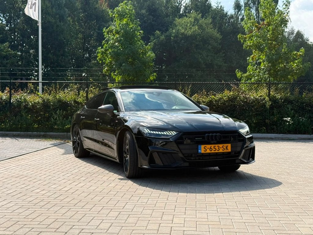 Audi A7 55 Tfsi e Quattro 367pk S Tronic 2020 Zwart PANO, Auto's, Audi, Dealer onderhouden, 4 cilinders, 4 stoelen, Zwart
